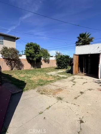 a view of a yard with an outdoor space