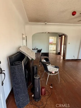 a room with furniture and wooden floor