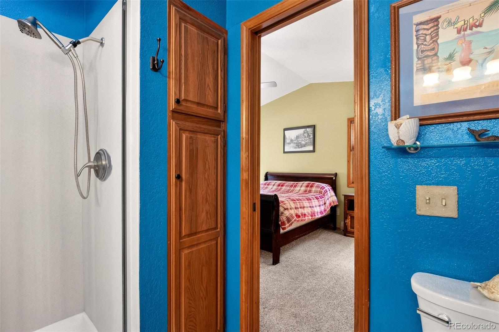 1445 Sutherland Road Manitou Springs, CO 80829 - Photo 19 of 43 a view of a hallway with a bedroom