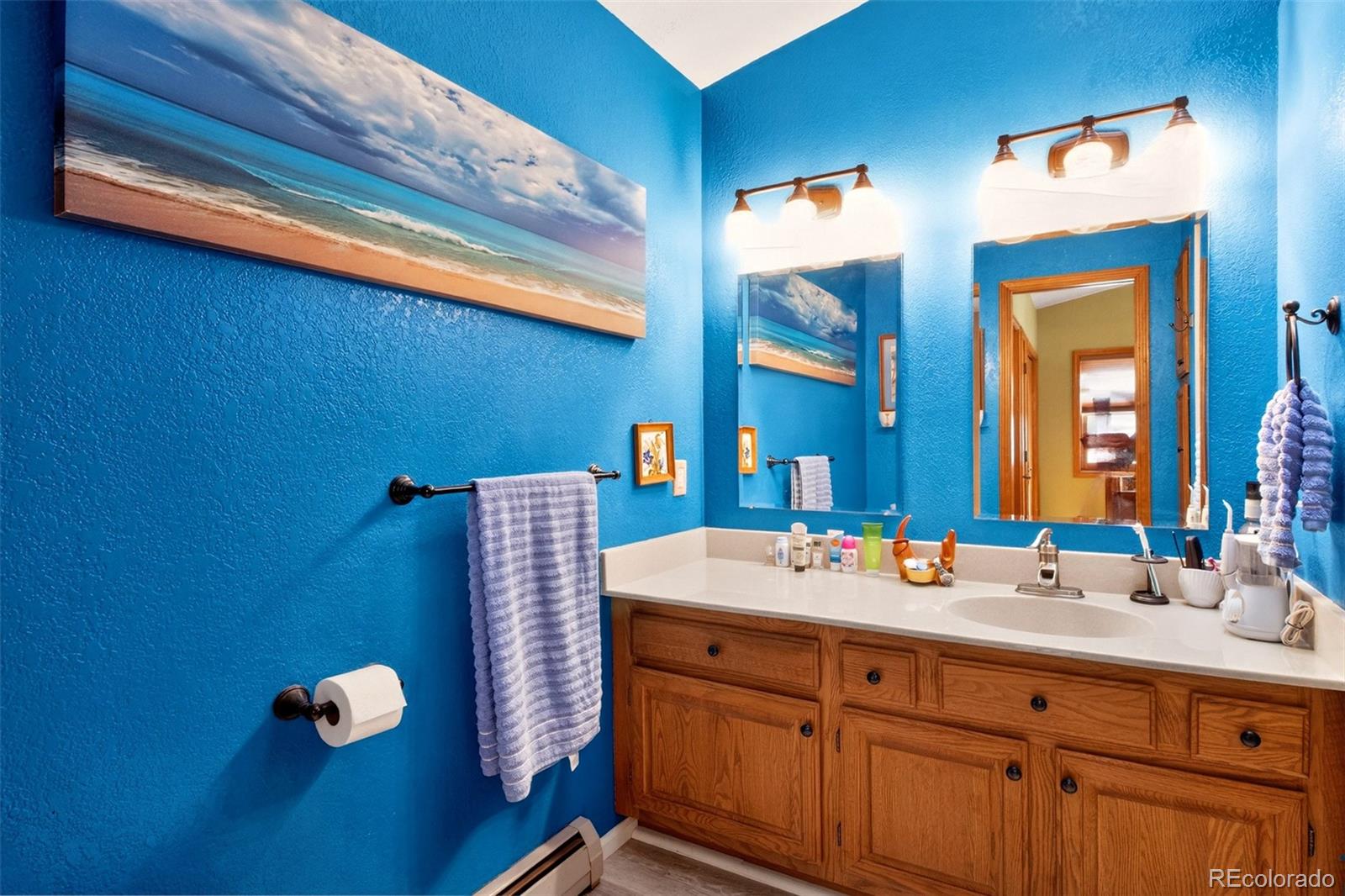 1445 Sutherland Road Manitou Springs, CO 80829 - Photo 20 of 43 a bathroom with a sink and a mirror