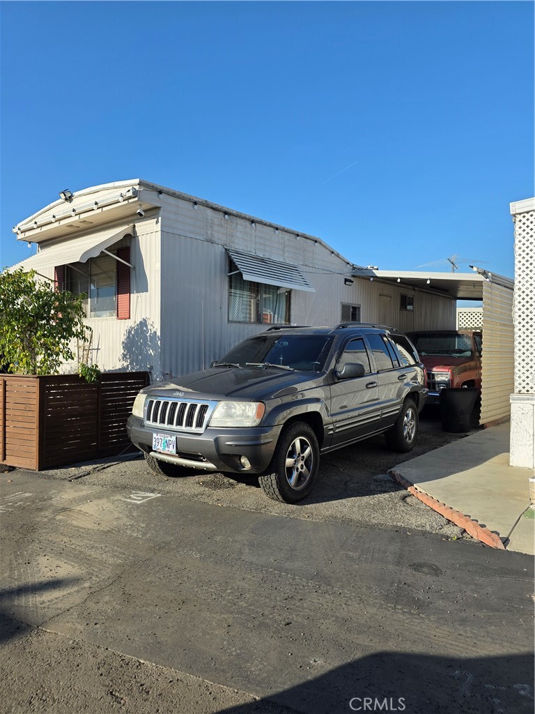 4849 Peck Road, Unit 39 El Monte, CA 91732 - Photo 2 of 6 a view of a car parked front of a house