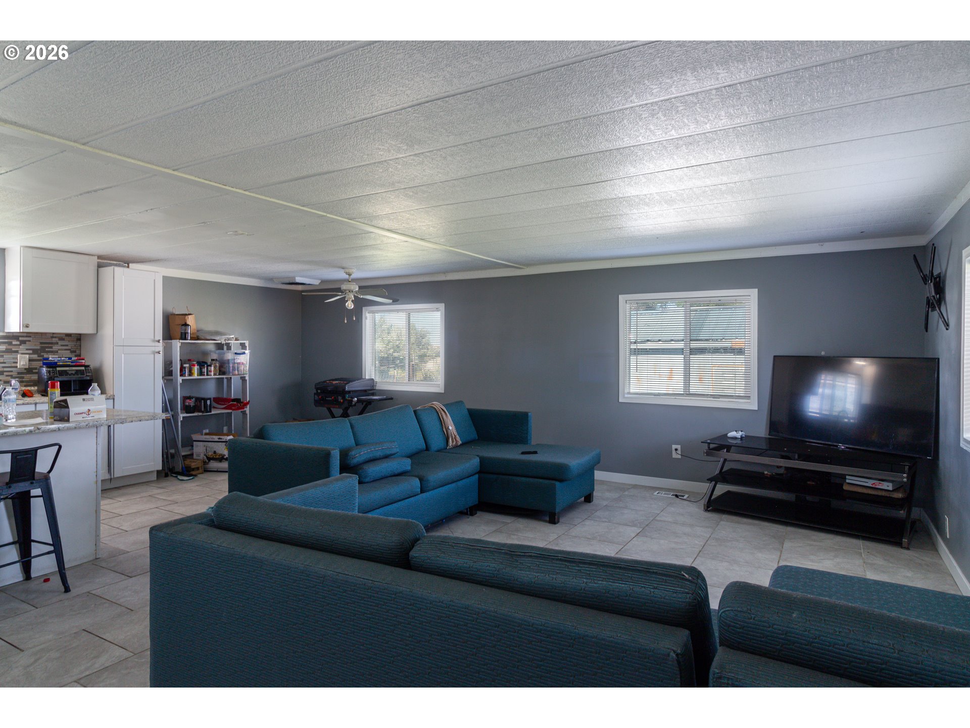 80649 Crooked Road Irrigon, OR 97844 - Photo 4 of 21 a living room with furniture and a flat screen tv