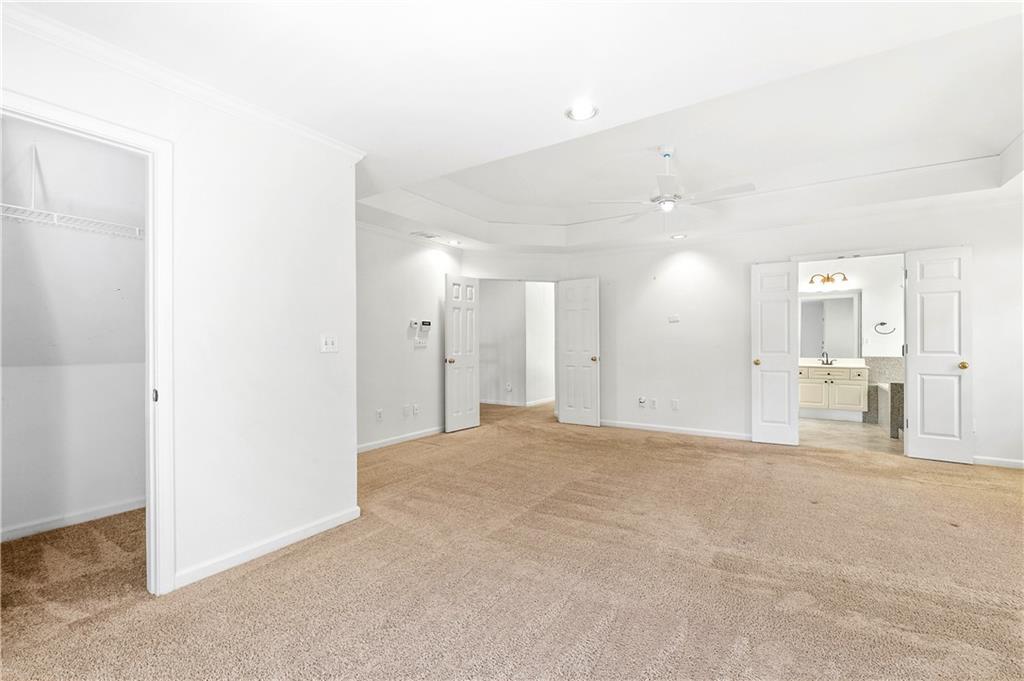 873 Red Rock Court Suwanee, GA 30024 - Photo 24 of 36 a view of a big room with a bathroom