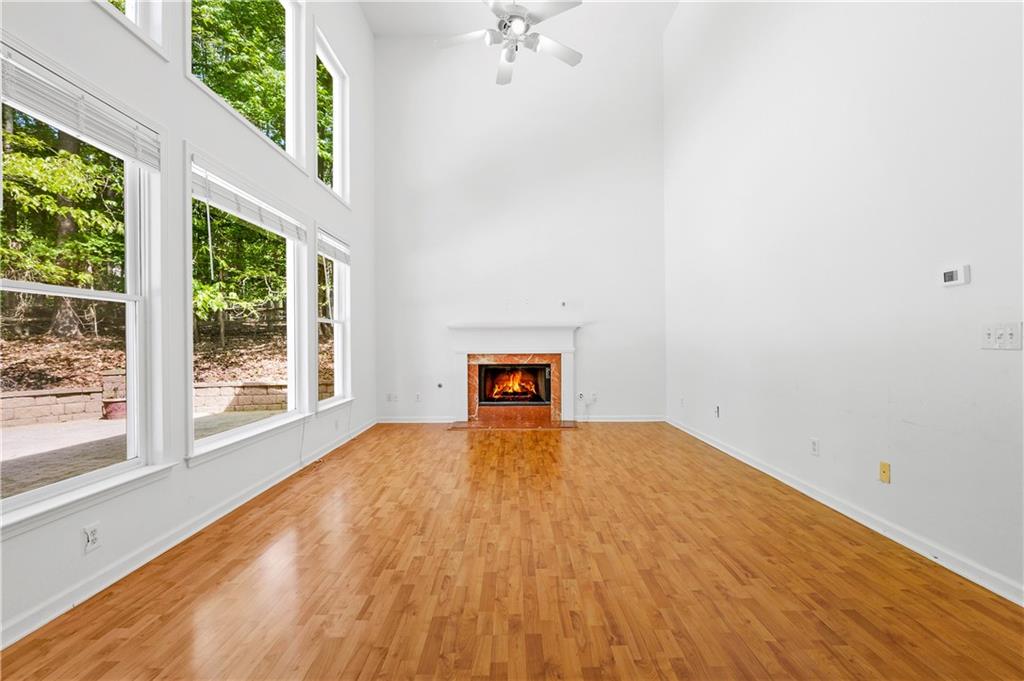873 Red Rock Court Suwanee, GA 30024 - Photo 8 of 36 a view of an empty room with a window