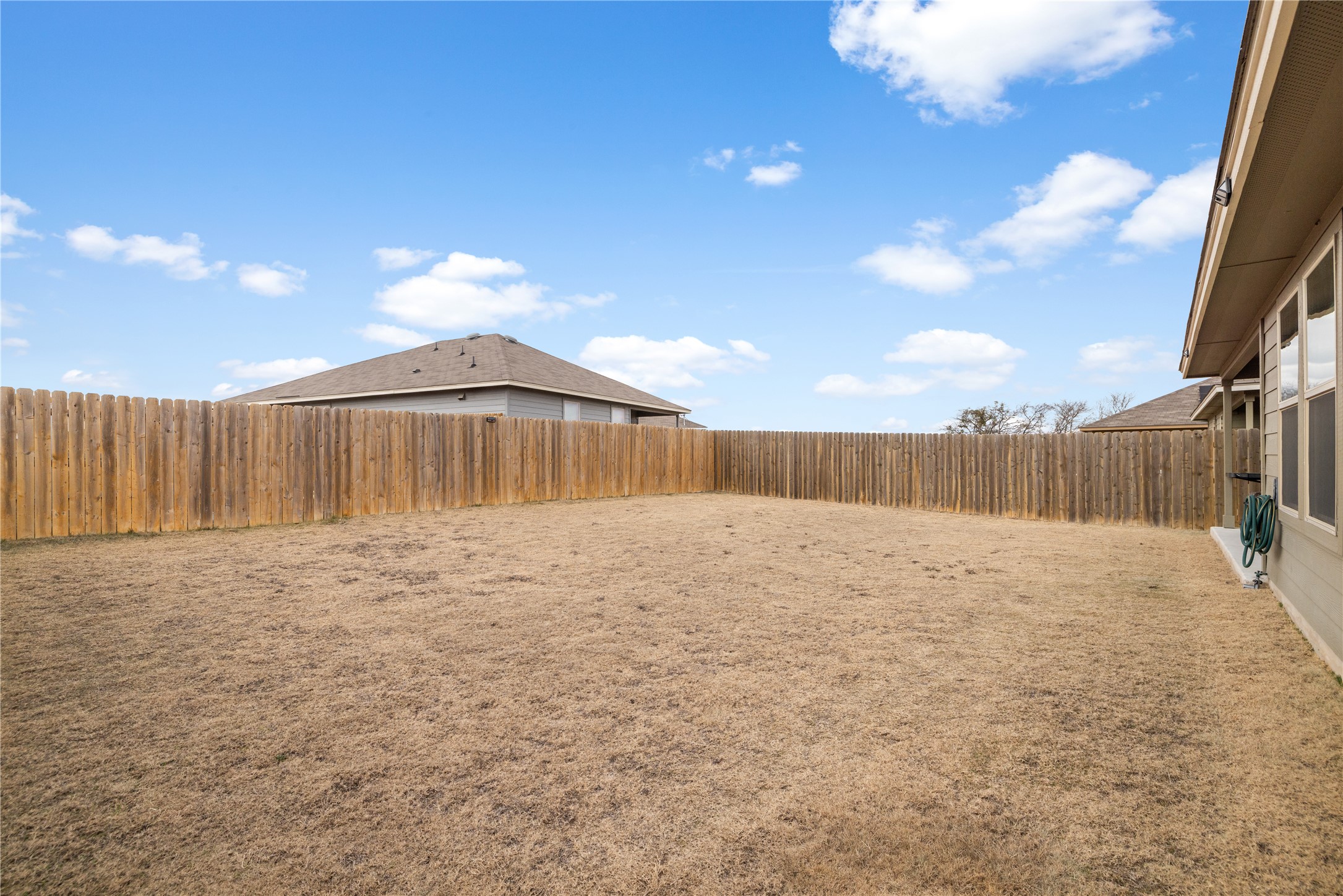 583 Taggart Trail Jarrell, TX 76537 - Photo 20 of 21 View of fenced backyard