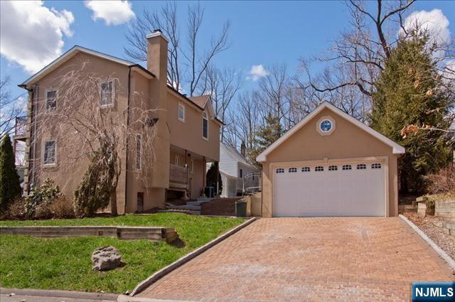 177 Magnolia Avenue Cresskill, NJ 07626 - Photo 15 of 15 a front view of house with yard