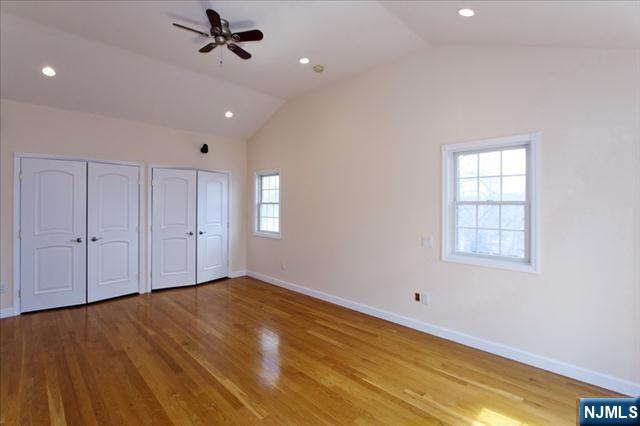 177 Magnolia Avenue Cresskill, NJ 07626 - Photo 8 of 15 a view of empty room with wooden floor and fan