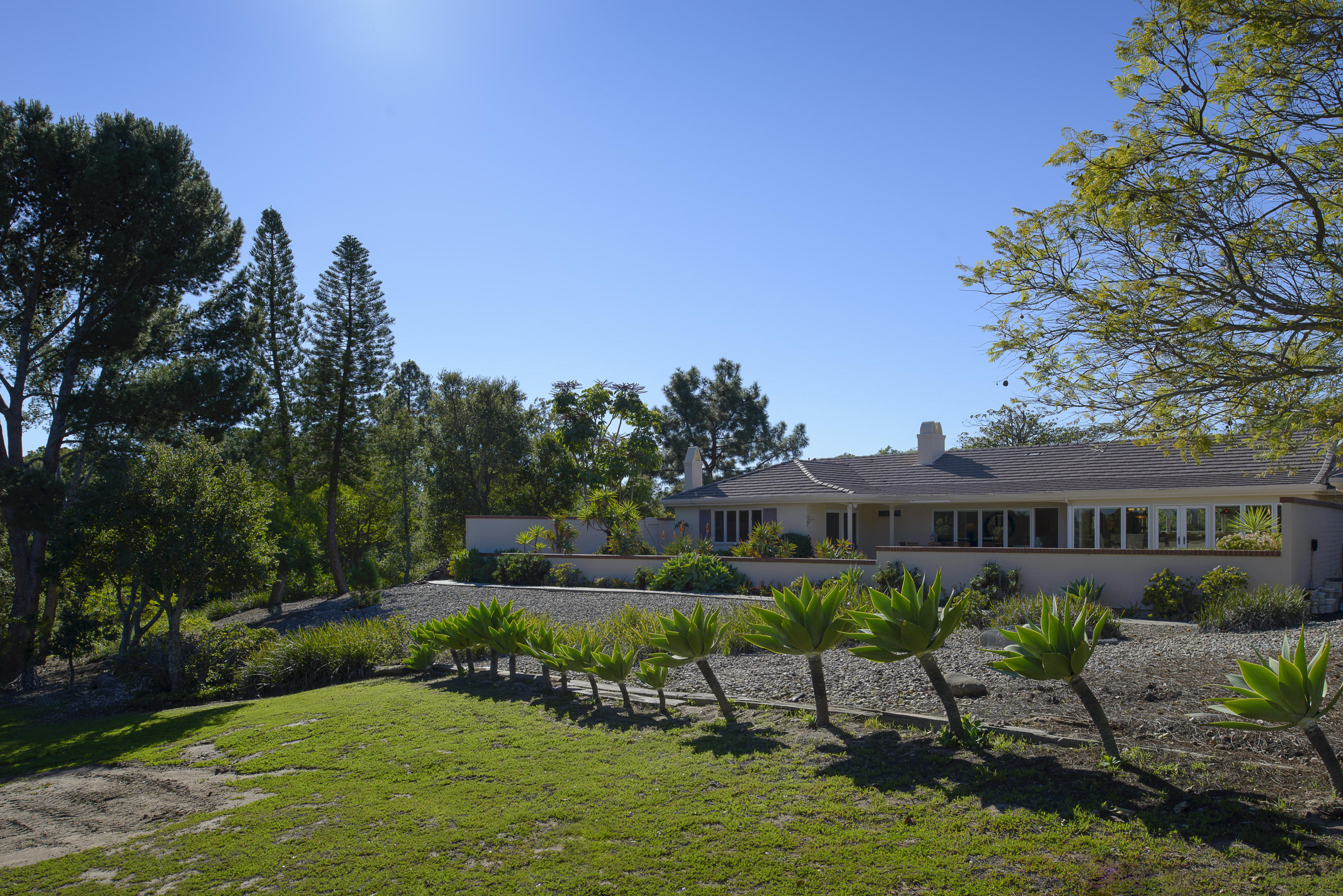 4460 Via Alegre Santa Barbara, CA 93110 - Photo 14 of 18 a view of a lake with a house in the background