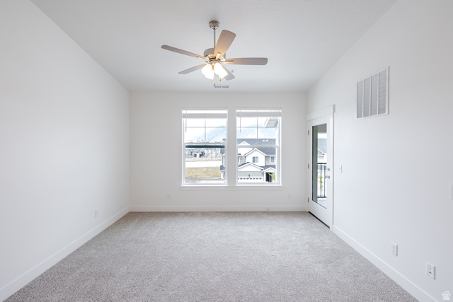 693 West 4500th South, Unit O301 Mapleton, UT 84664 - Photo 15 of 16 Carpeted spare room with ceiling fan and baseboards