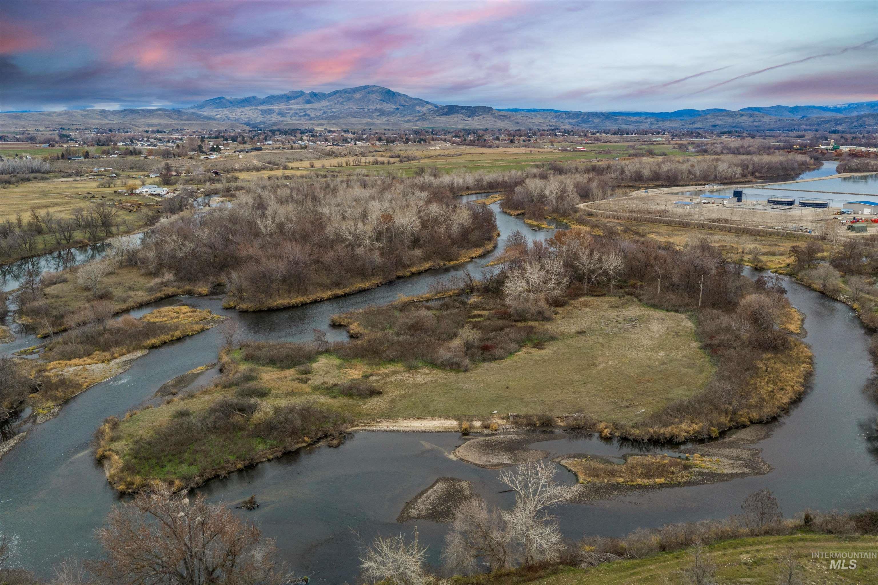 Tbd Cascade Road Emmett, ID 83617 - Photo 23 of 40 Aerial view at dusk of a water and mountain view