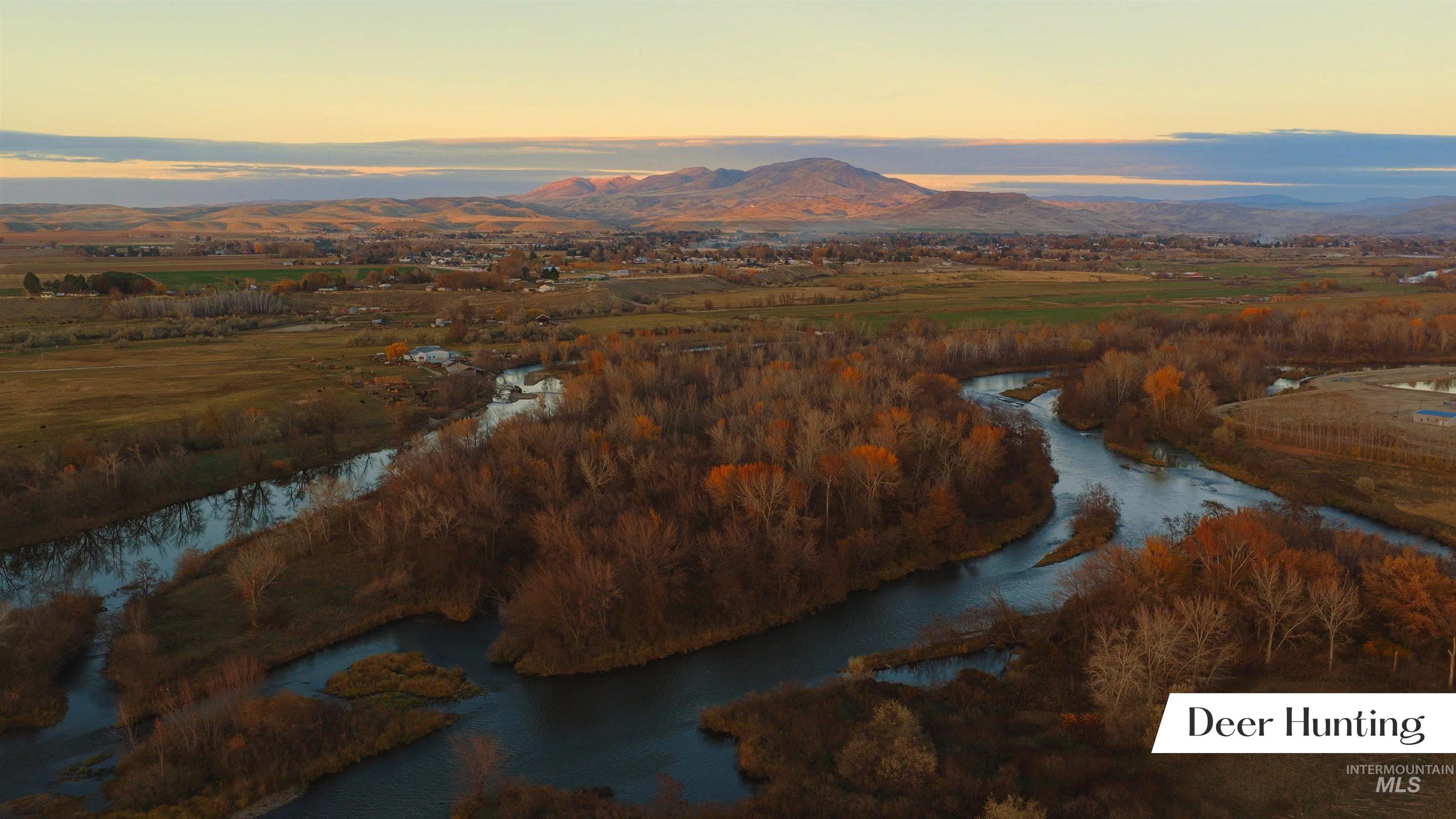 Tbd Cascade Road Emmett, ID 83617 - Photo 25 of 40 Aerial view at dusk of a water and mountain view