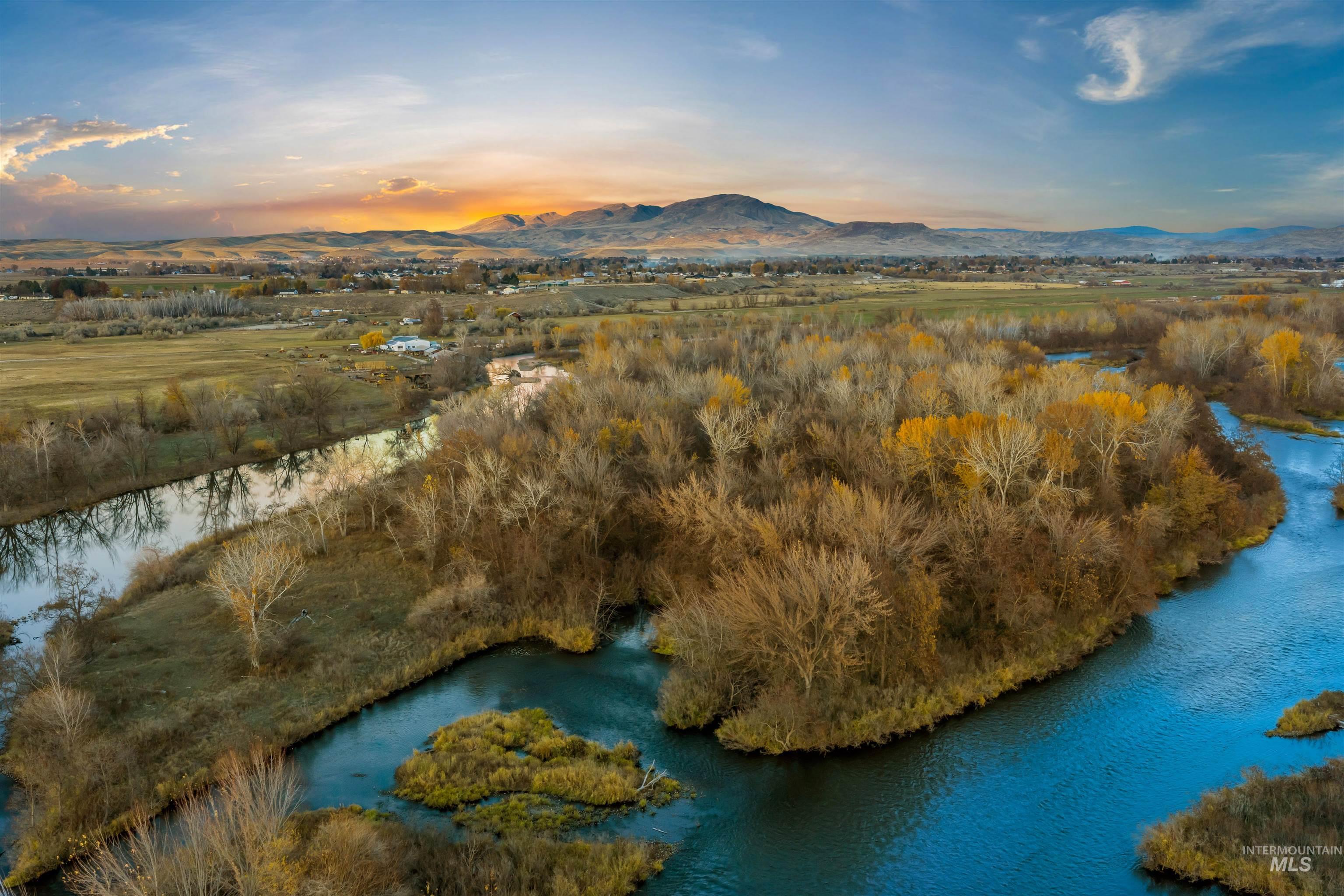 Tbd Cascade Road Emmett, ID 83617 - Photo 3 of 40 Aerial view at dusk of a water and mountain view