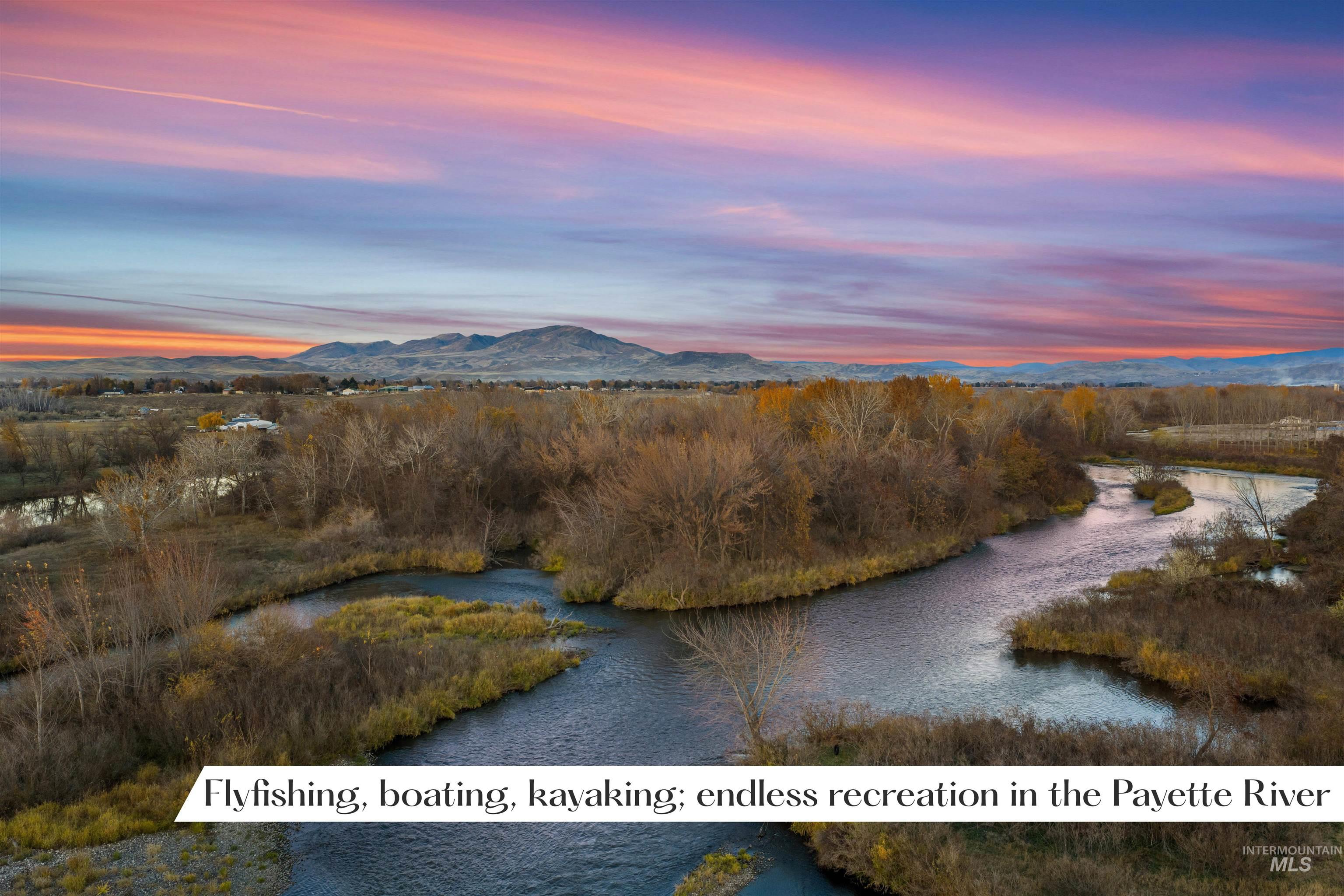 Tbd Cascade Road Emmett, ID 83617 - Photo 32 of 40 Aerial view at dusk of a water and mountain view