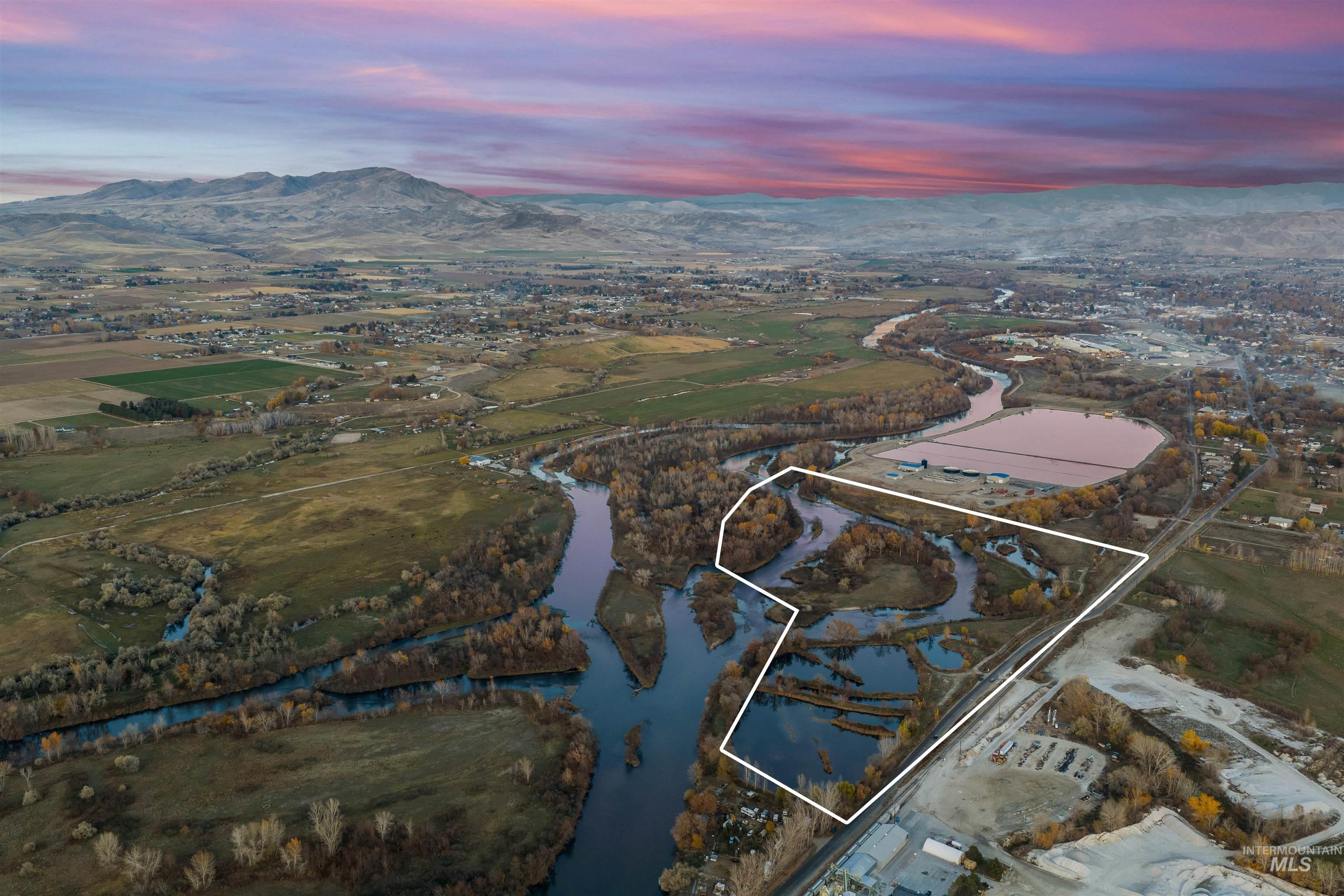 Tbd Cascade Road Emmett, ID 83617 - Photo 38 of 40 Aerial view at dusk of property boundaries highlighted and a water and mountain view