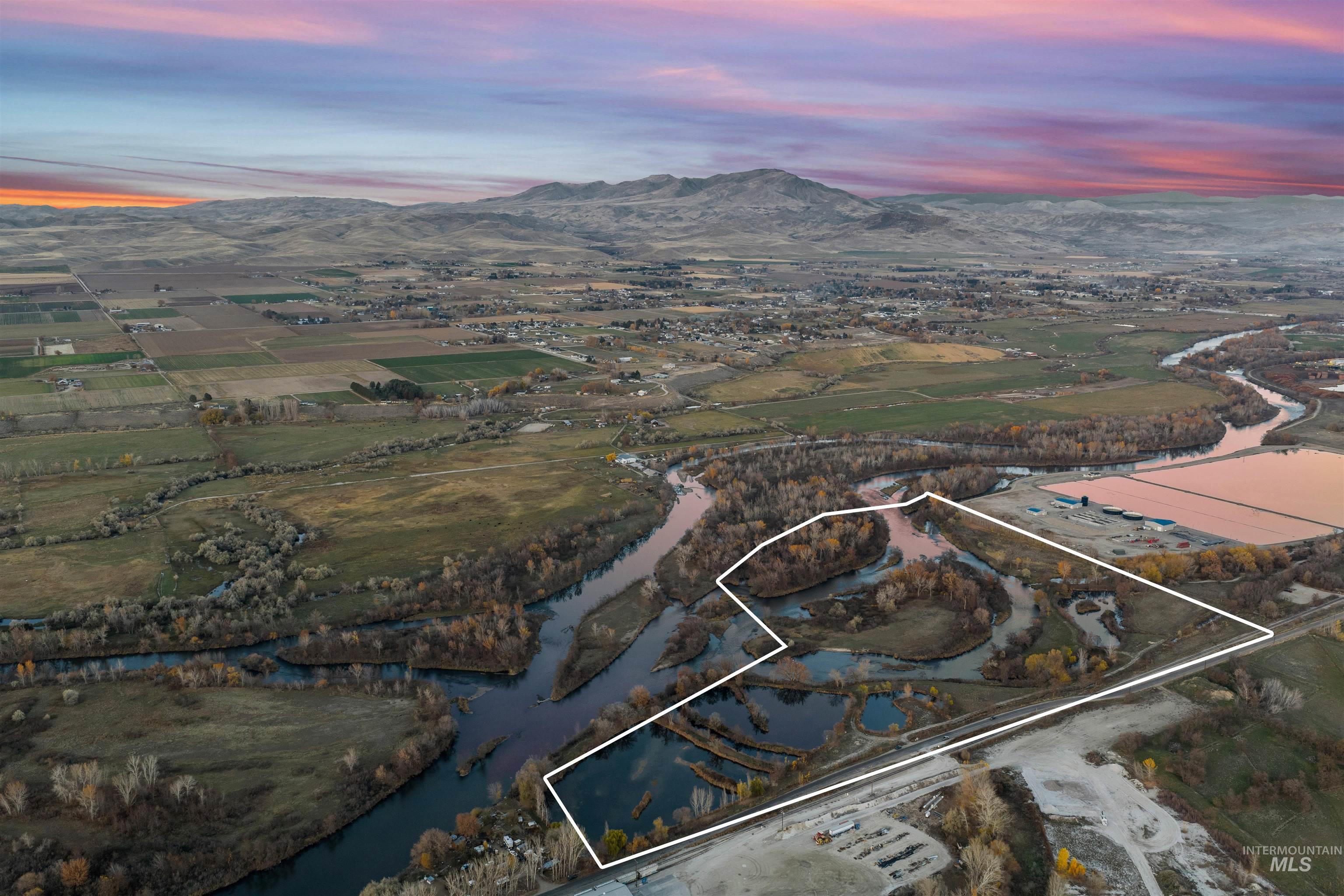 Tbd Cascade Road Emmett, ID 83617 - Photo 40 of 40 Aerial view at dusk of property parcel outlined and a mountain view