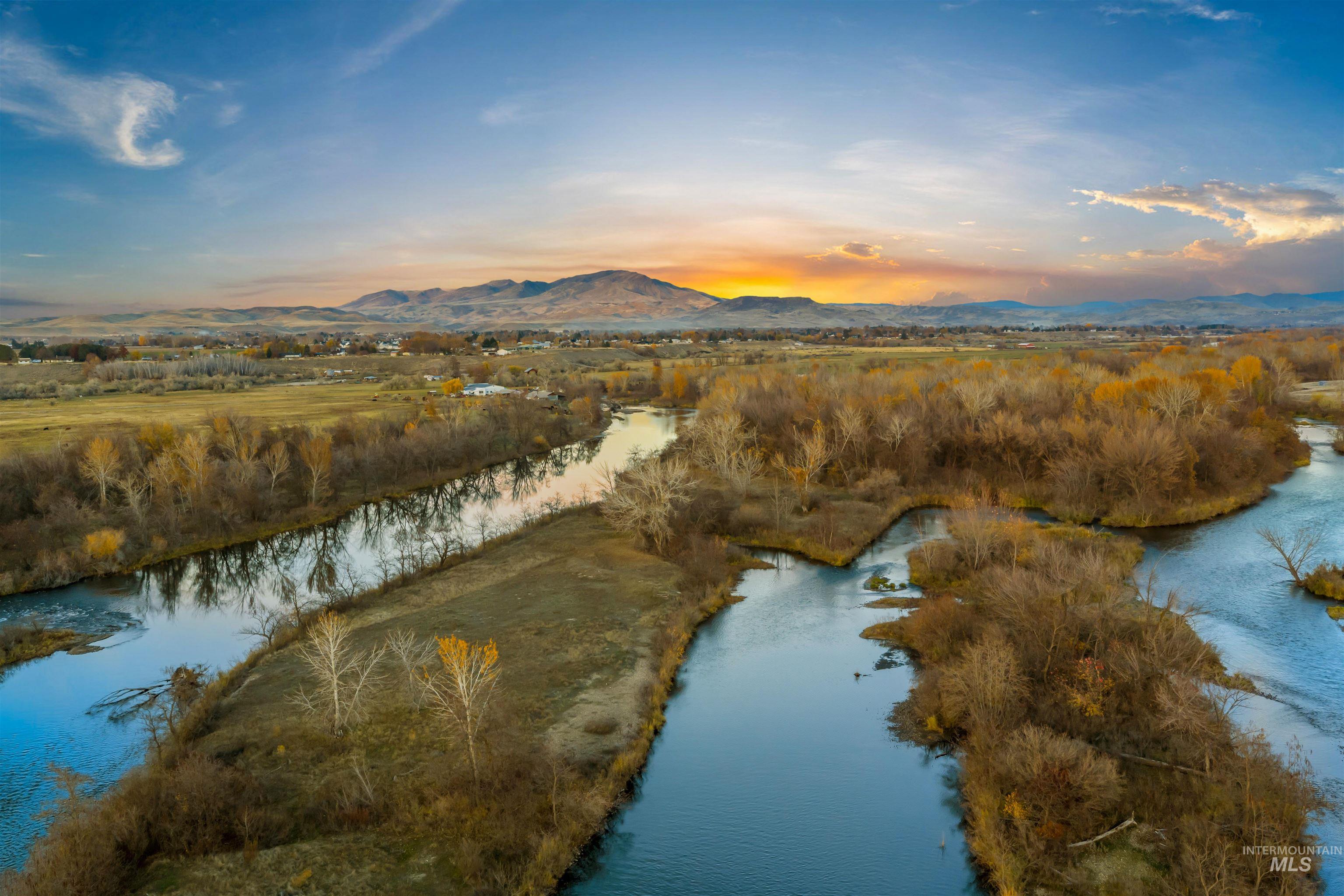 Tbd Cascade Road Emmett, ID 83617 - Photo 4 of 40 Aerial view at dusk of a water and mountain view