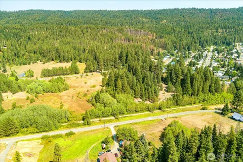 a view of swimming pool from a yard