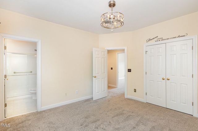 an empty room with a hallway