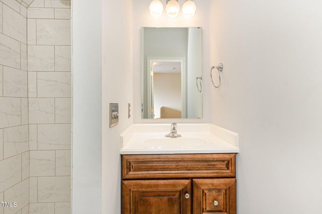 a sink with a mirror