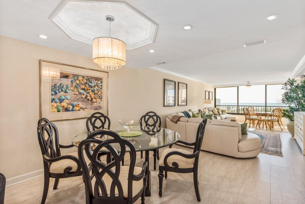 5770 Midnight Pass Road, Unit 605 Sarasota, FL 34242 - Photo 9 of 42 a view of a dining room with furniture window and outside view
