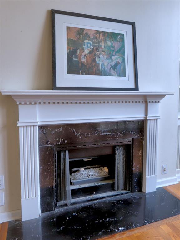3636 Habersham Road Northwest, Unit 2308 Atlanta, GA 30305 - Photo 5 of 42 a view of fireplace and a painting on the wall