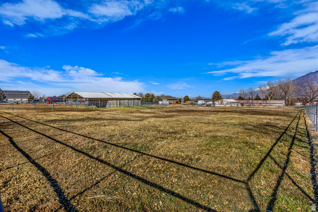 1060 West 2620th Street South Mapleton, UT 84664 - Photo 58 of 87 View of yard featuring an outbuilding and a mountain view