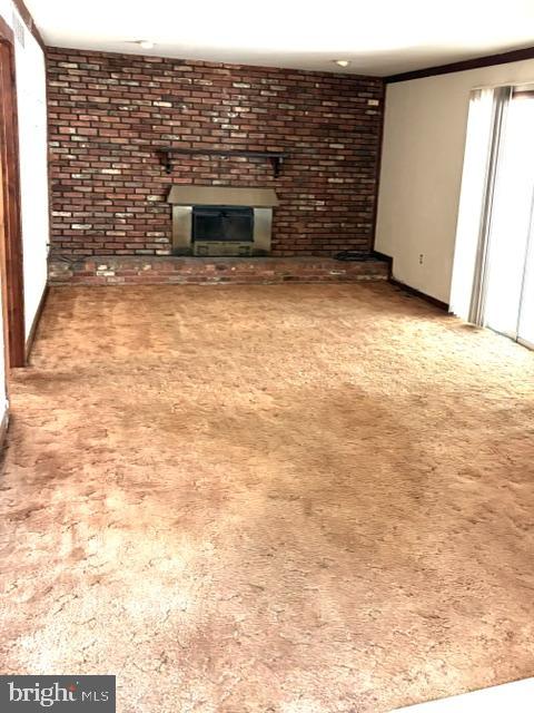 108 Kingbrook Road Linthicum Heights, MD 21090 - Photo 5 of 15 a view of empty room with a fireplace