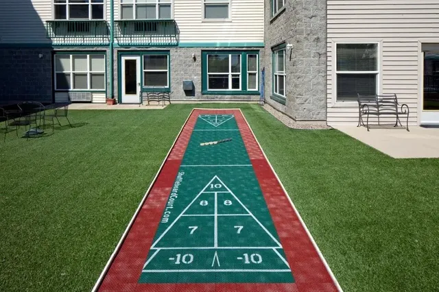 a view of swimming pool with a yard