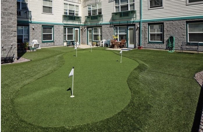 11939 Northeast Davis Street Portland, OR 97220 - Photo 3 of 14 front view of a brick building with a yard