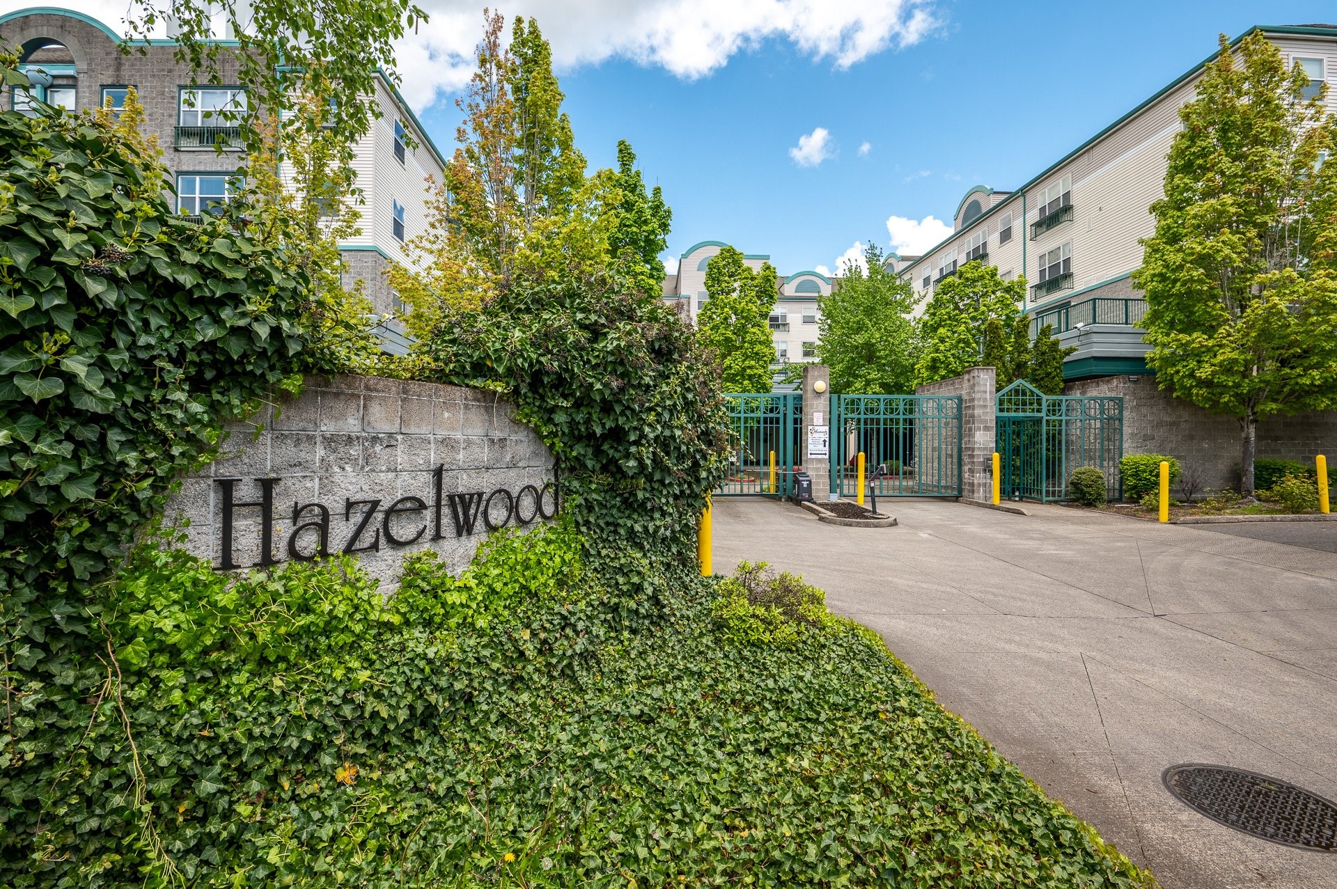 11939 Northeast Davis Street Portland, OR 97220 - Photo 6 of 14 front view of a house with a yard and potted plants