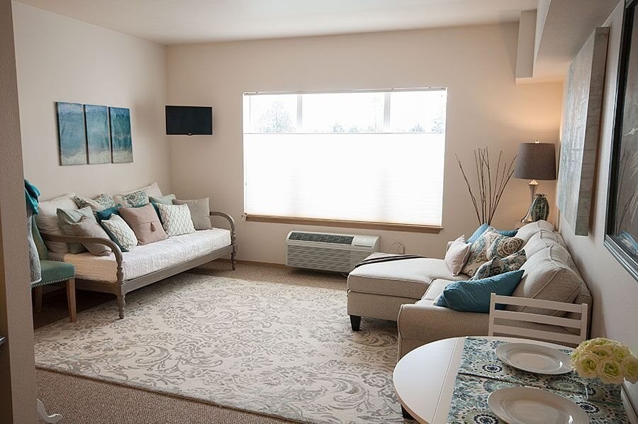 11939 Northeast Davis Street Portland, OR 97220 - Photo 7 of 14 a living room with furniture and a couch