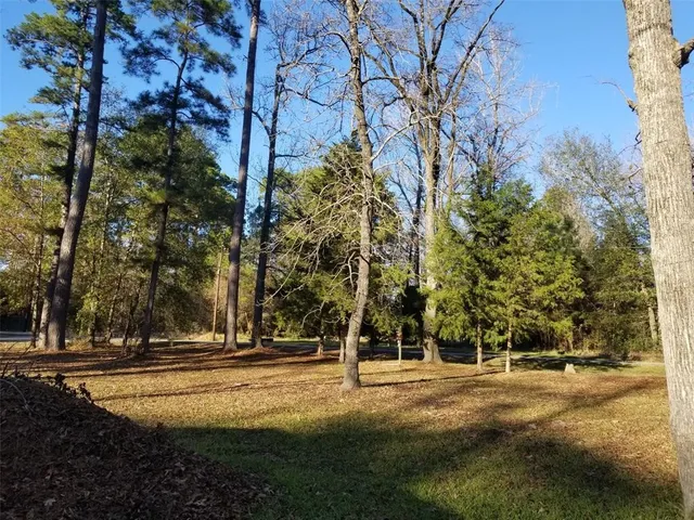 a view of a building with trees
