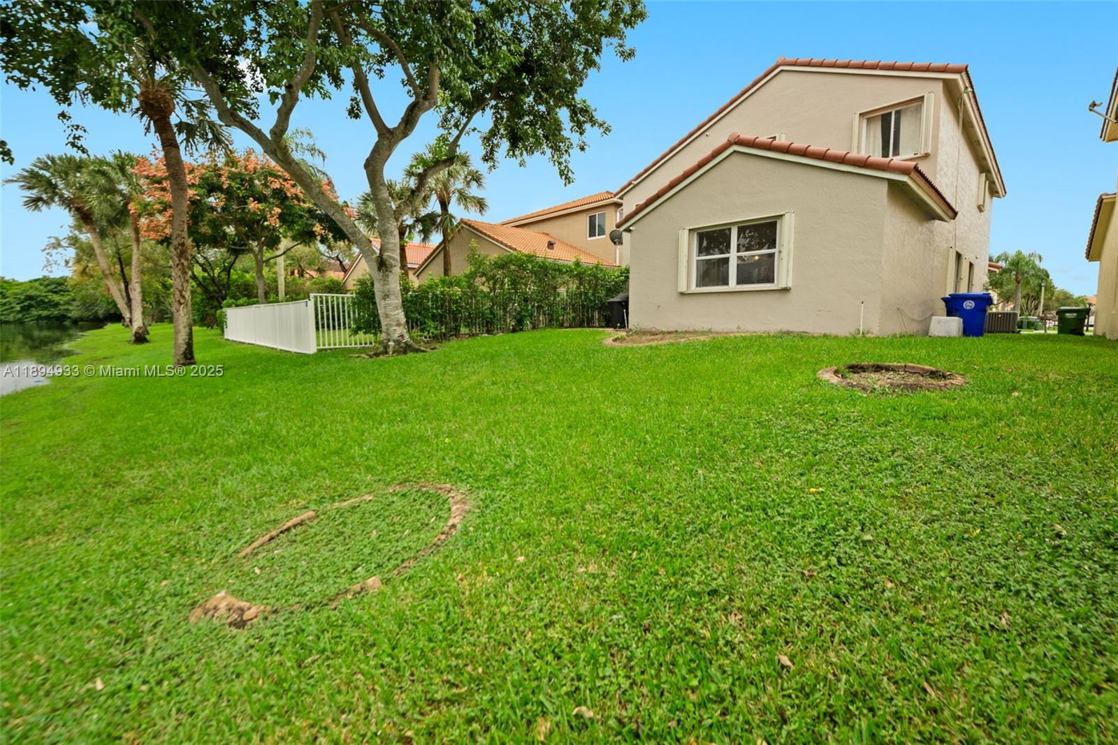 1611 Southwest 158th Avenue Pembroke Pines, FL 33027 - Photo 24 of 25 a view of front of a house with a yard