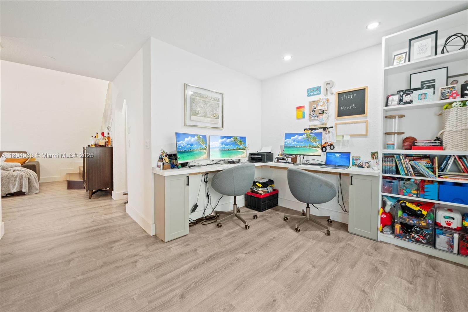 1611 Southwest 158th Avenue Pembroke Pines, FL 33027 - Photo 7 of 25 a room with a wooden floor and furniture