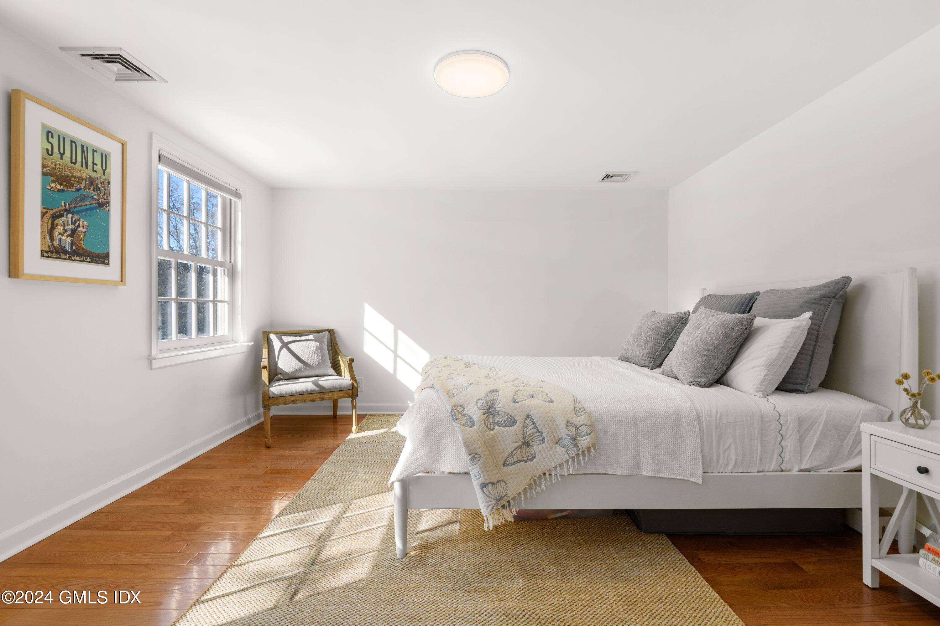 6 Miltiades Avenue Riverside, CT 06878 - Photo 14 of 24 a bedroom with a bed and a window