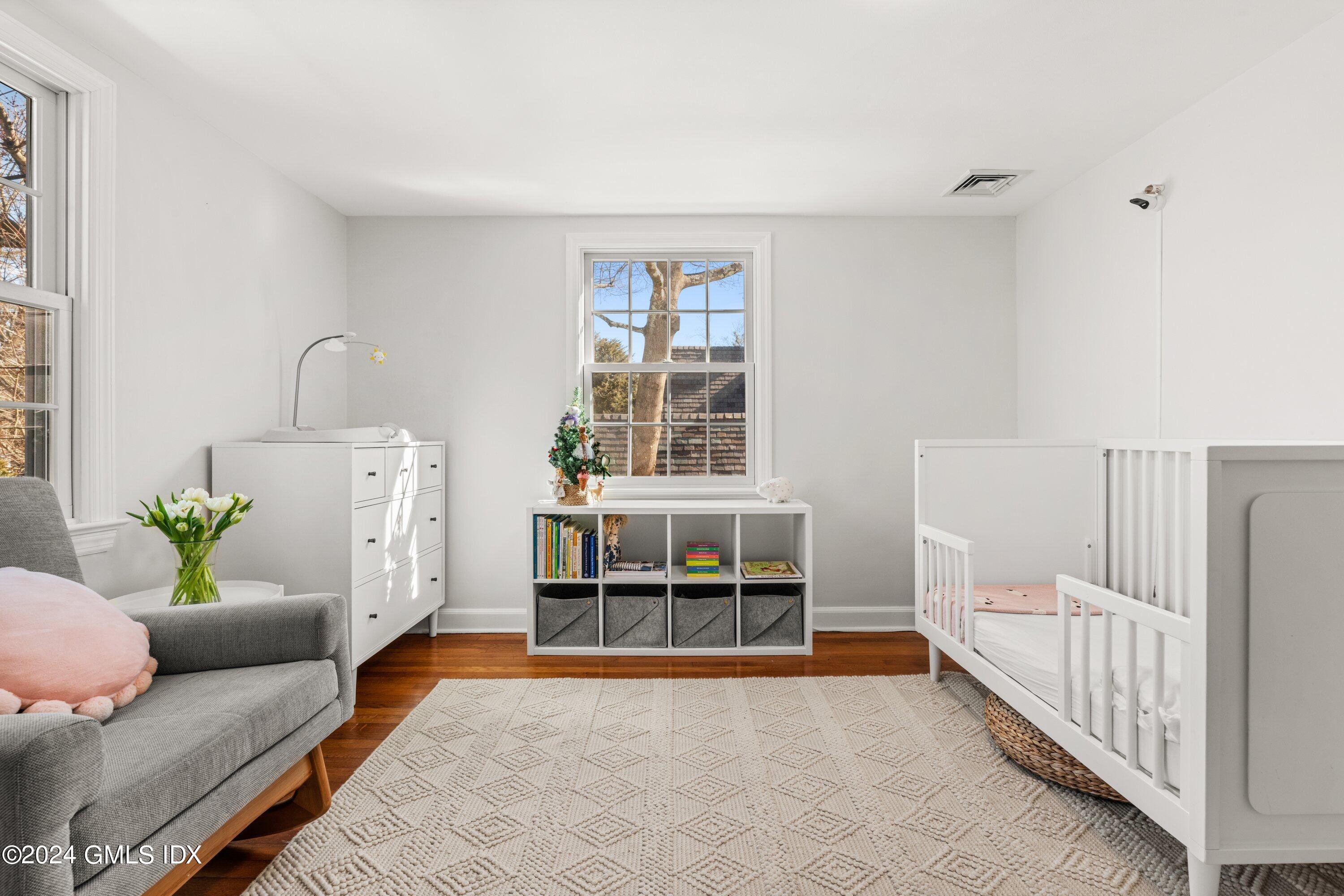 6 Miltiades Avenue Riverside, CT 06878 - Photo 16 of 24 a living room with furniture and a window