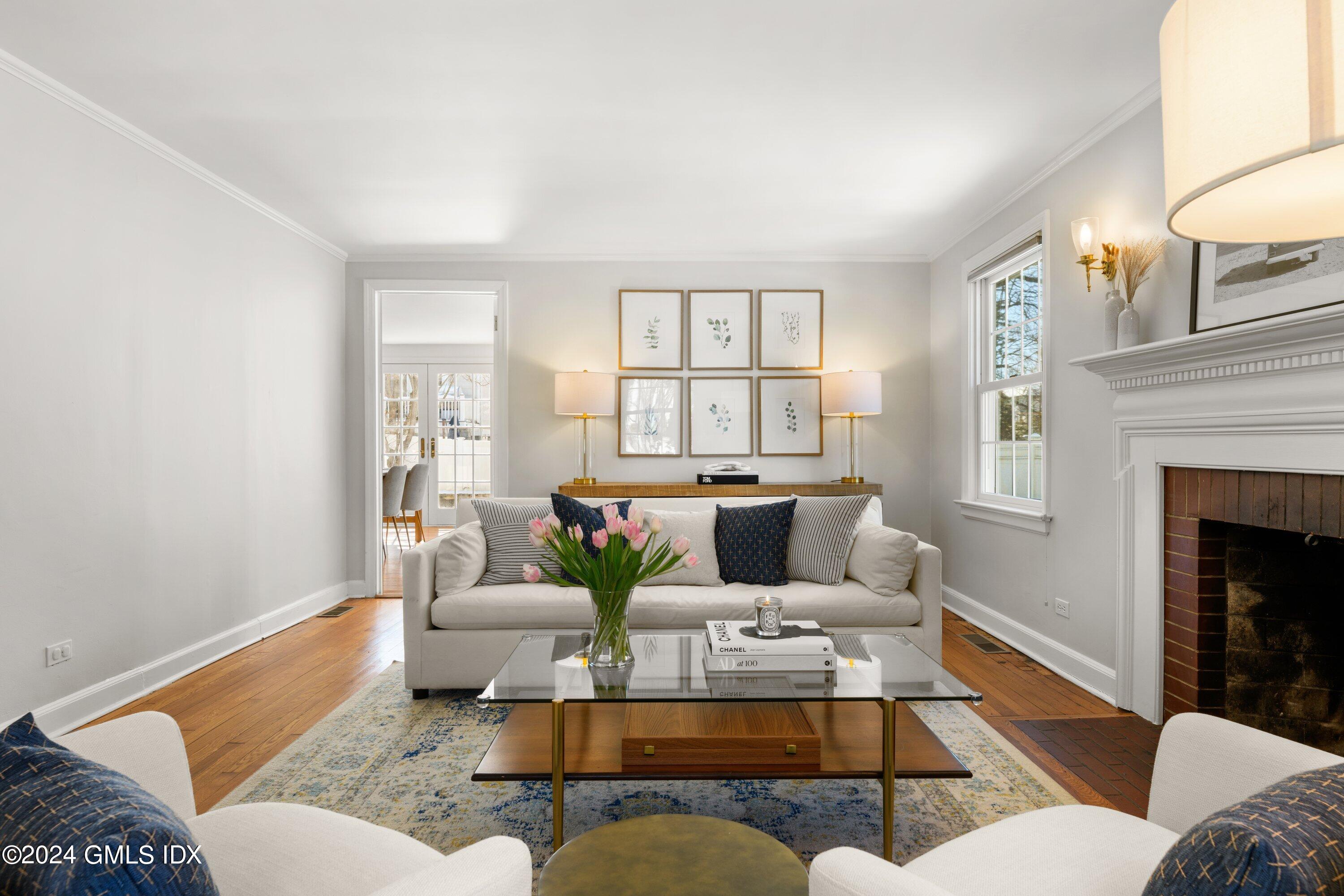 6 Miltiades Avenue Riverside, CT 06878 - Photo 3 of 24 a living room with furniture and a fireplace