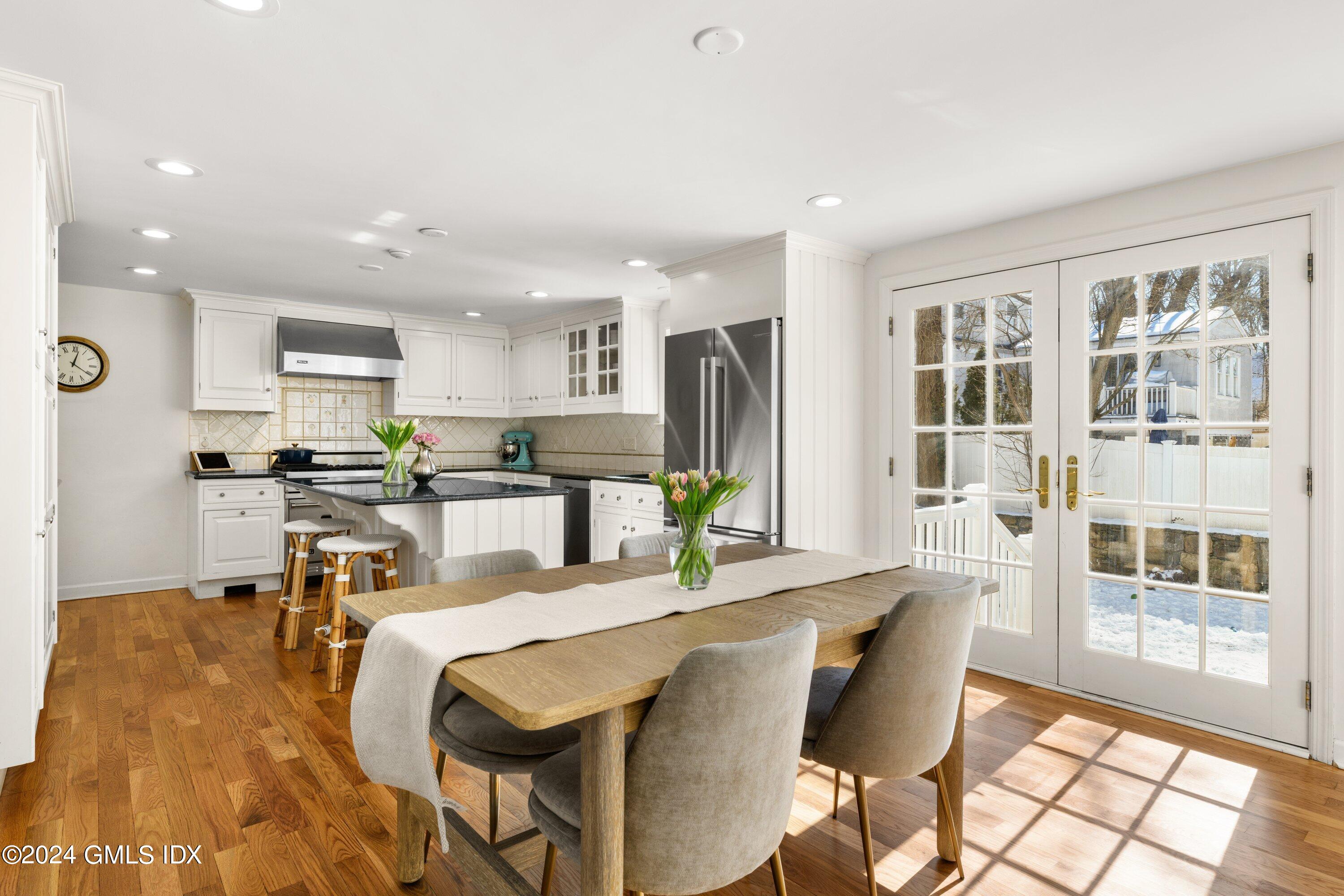 6 Miltiades Avenue Riverside, CT 06878 - Photo 7 of 24 a living room with stainless steel appliances kitchen island granite countertop furniture and a view of kitchen