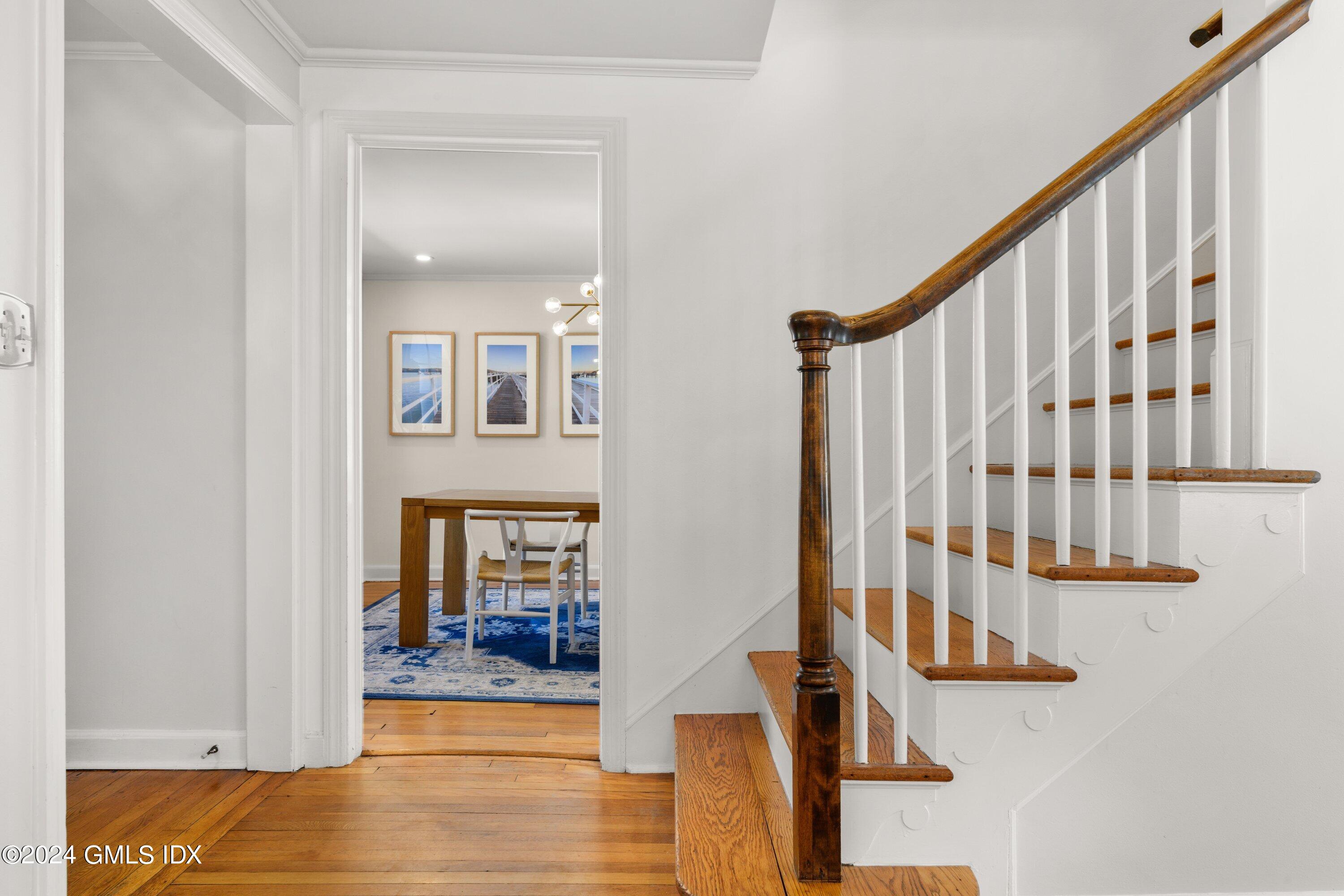 6 Miltiades Avenue Riverside, CT 06878 - Photo 10 of 24 a view of staircase with white walls and a window
