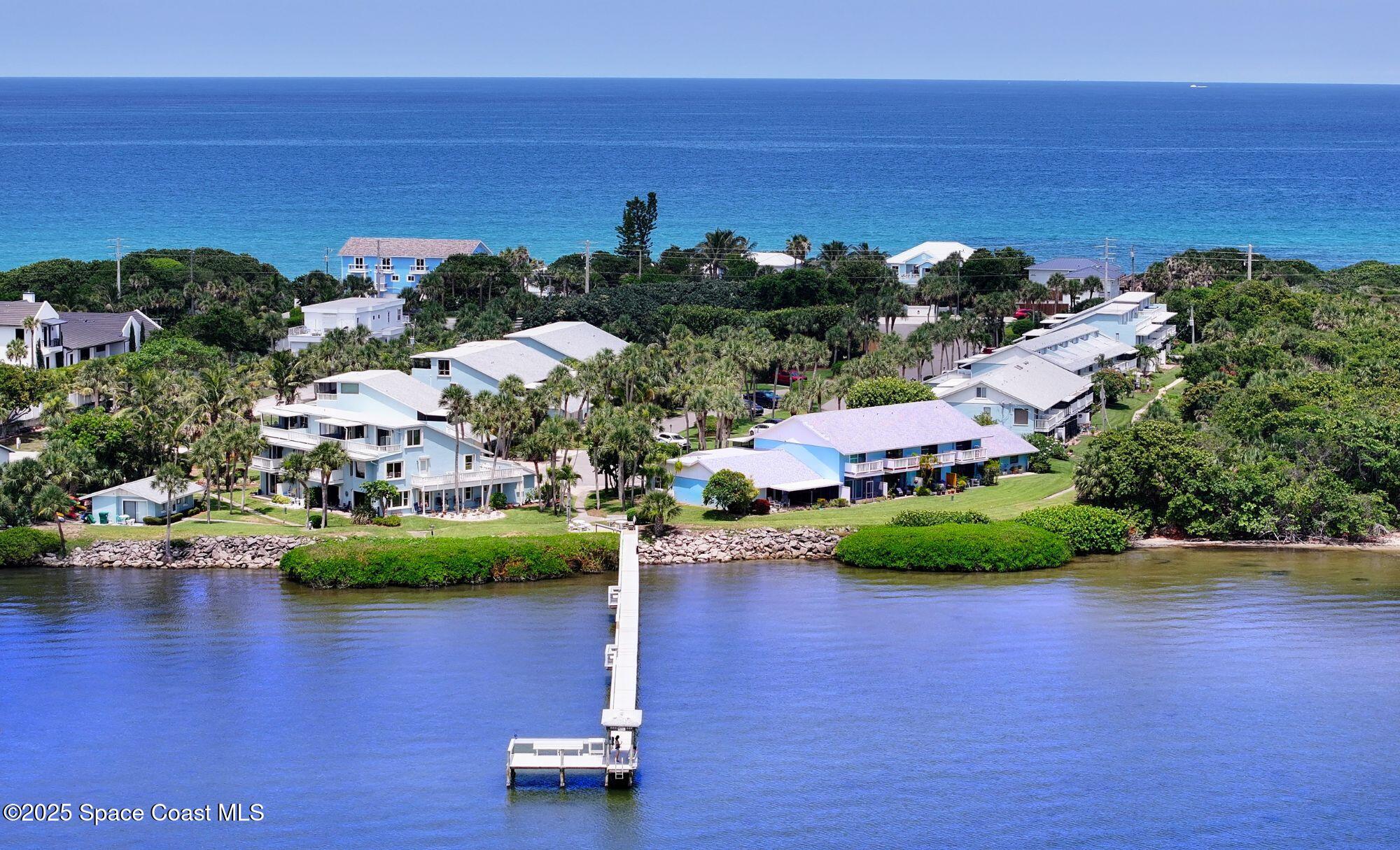 21 Cove Road, Unit 21E Melbourne Beach, FL 32951 - Photo 1 of 30 a view of a lake with outdoor space