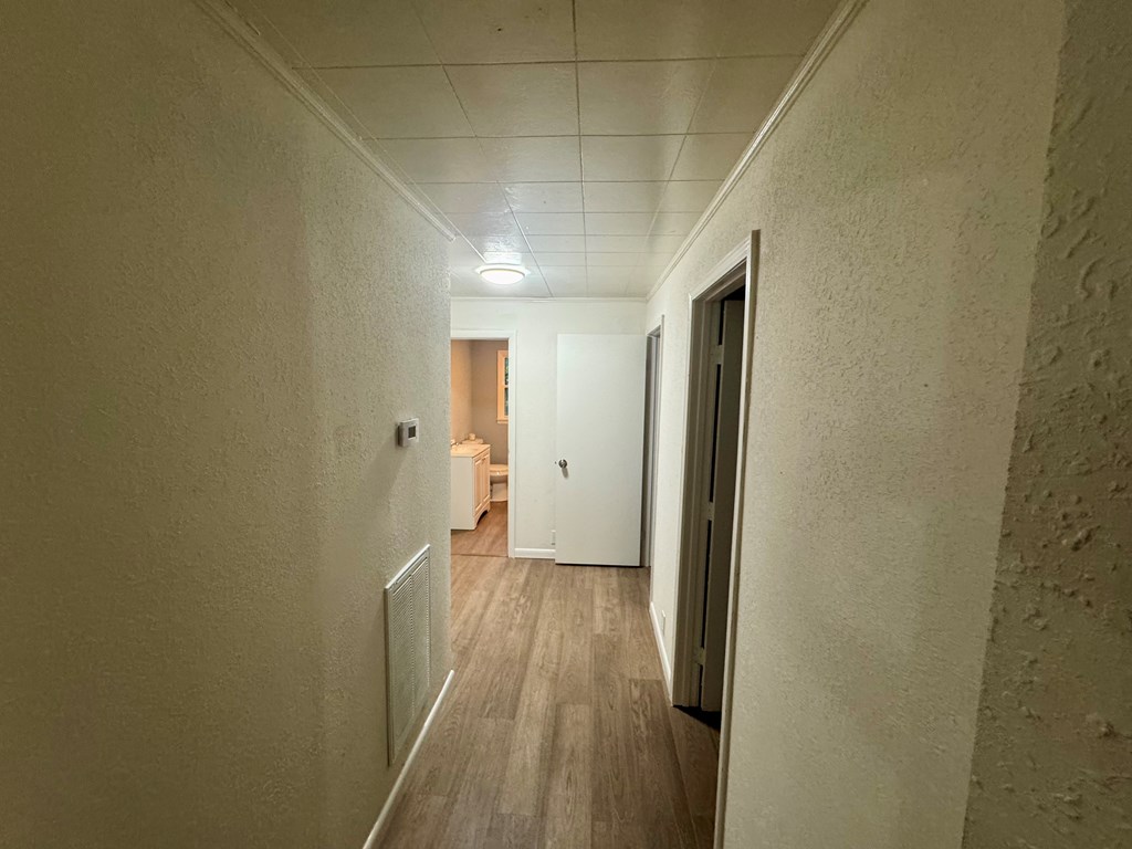 30 McClure Road Epworth, GA 30541 - Photo 15 of 27 a view of hallway with wooden floor