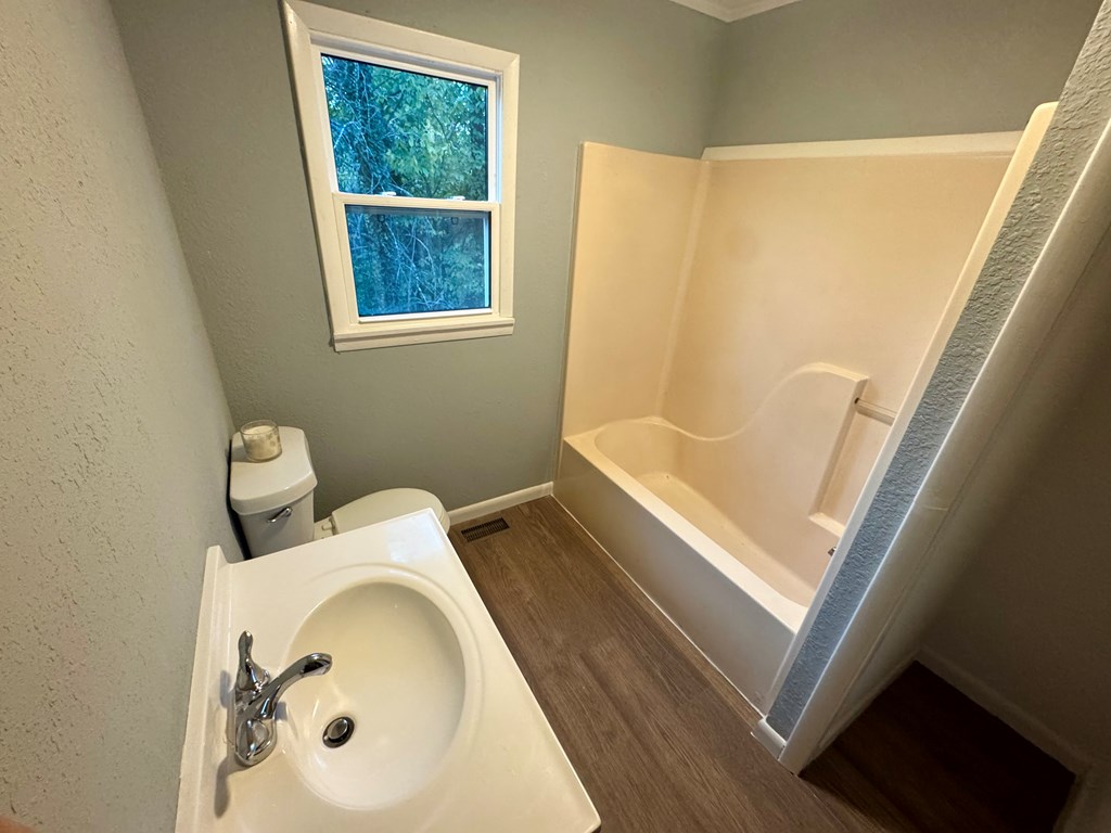 30 McClure Road Epworth, GA 30541 - Photo 16 of 27 a bathroom with a sink and a mirror