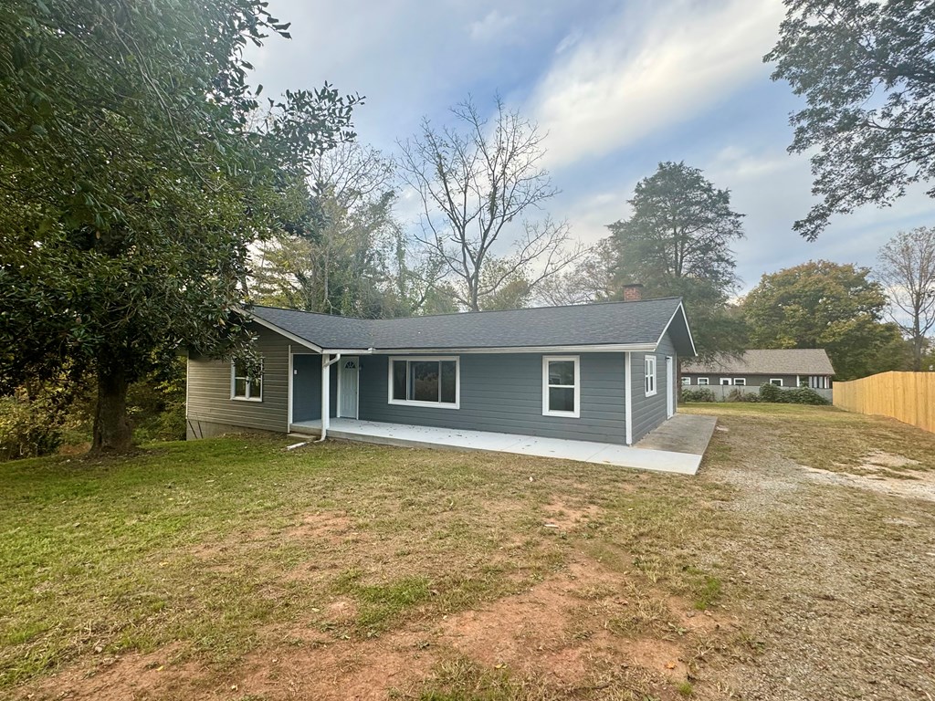 30 McClure Road Epworth, GA 30541 - Photo 17 of 27 front view of a house with a yard