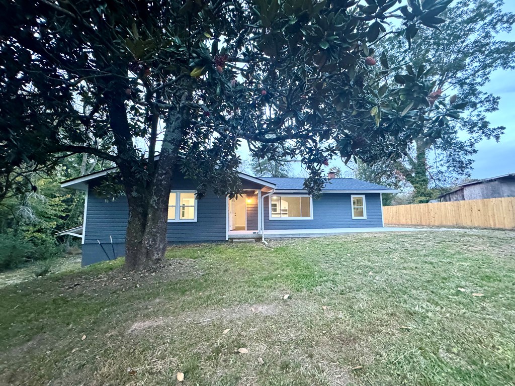 30 McClure Road Epworth, GA 30541 - Photo 2 of 27 a house is sitting in middle of the forest