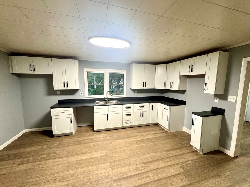 30 McClure Road Epworth, GA 30541 - Photo 26 of 27 a large kitchen with stainless steel appliances granite countertop a stove a sink dishwasher and a refrigerator