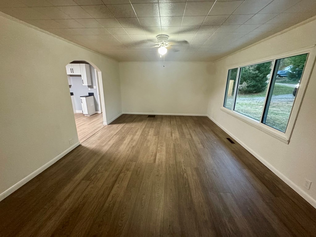 30 McClure Road Epworth, GA 30541 - Photo 10 of 27 wooden floor in an empty room with a window