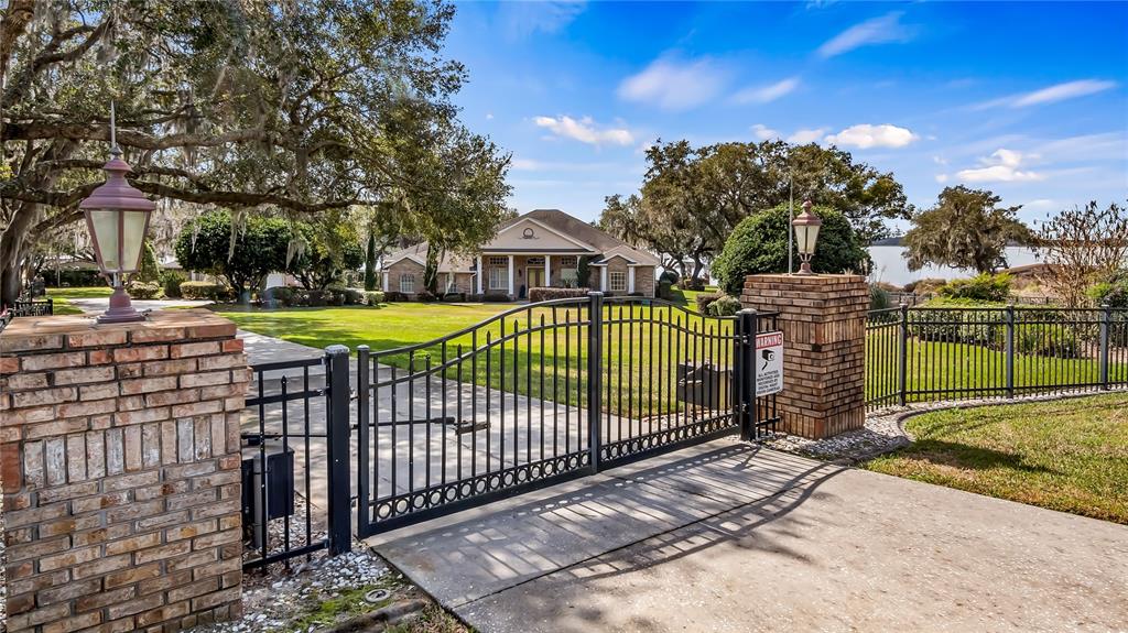 a view of a wrought iron fences in front of house