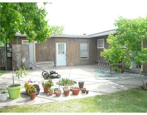 a front view of a house with patio