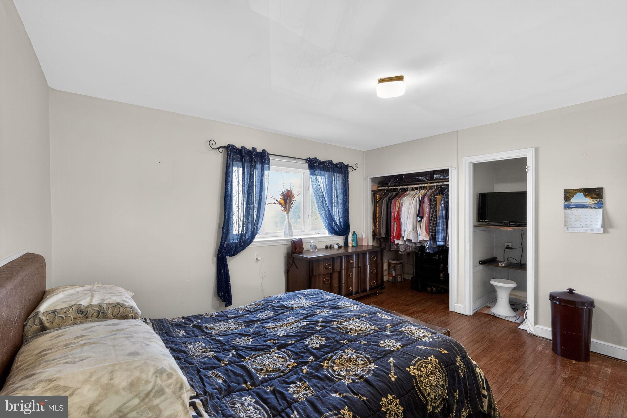 8238 Forrest Avenue Philadelphia, PA 19150 - Photo 18 of 29 a bedroom with a bed and a closet