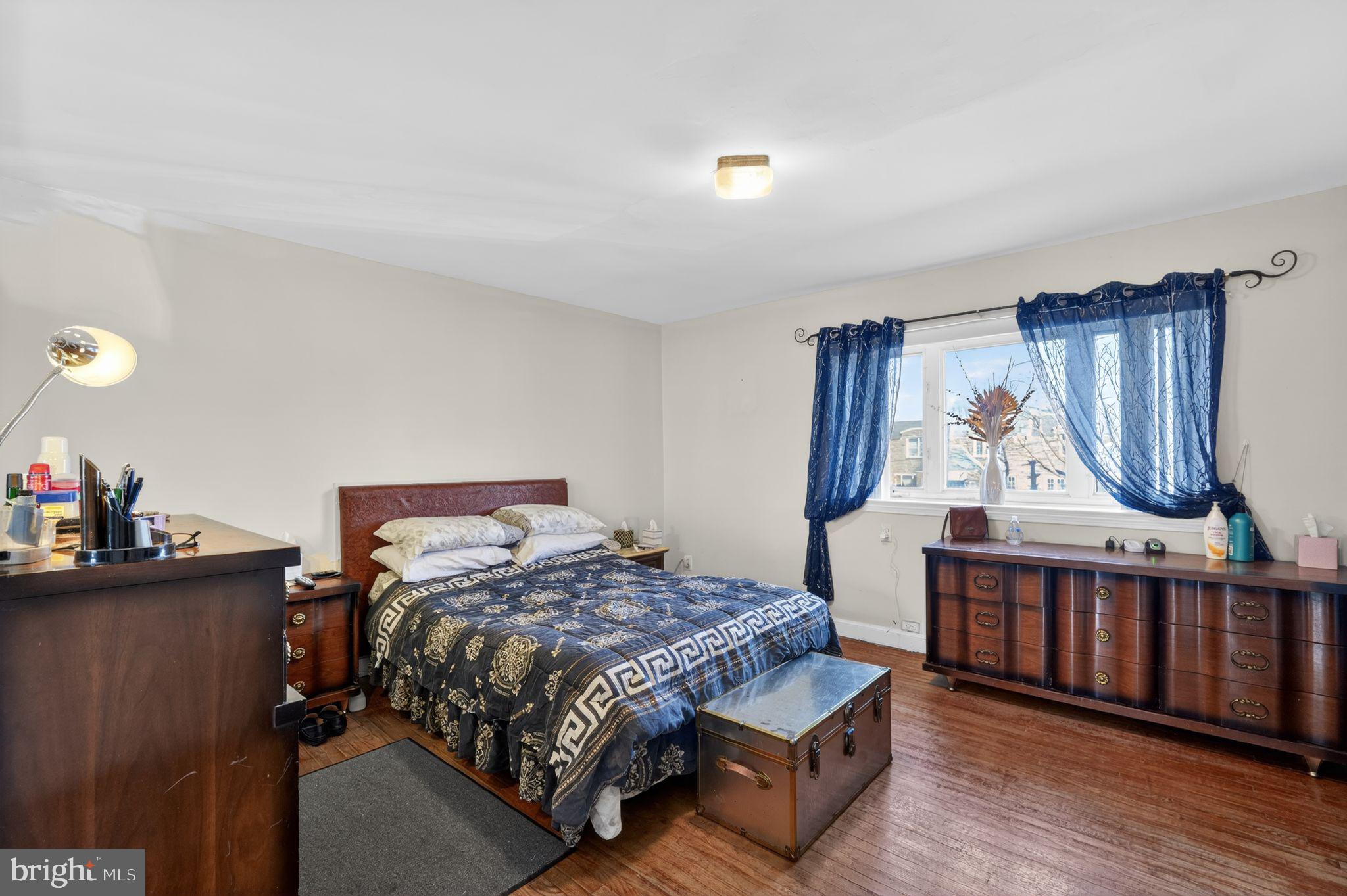 8238 Forrest Avenue Philadelphia, PA 19150 - Photo 19 of 29 a bedroom with a bed and a window